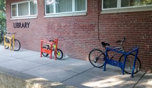 Colorful bike racks were installed outside the Takoma Park Maryland Library encourage reading in the city's four most spoken languages.