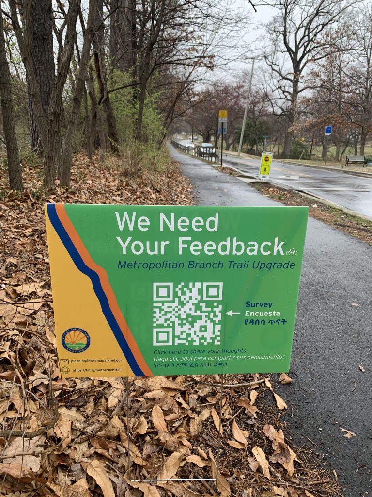 Yard Sign with Information about a Survey for the Metropolitan Branch Trail Upgrade Project